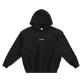 Unisex boxy hoodie in black with a drop shoulder design and centered micro Fitversal wordmark.