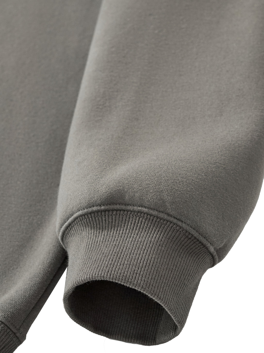 Detail of the HAVEN™ Boxy Hoodie showcasing its cuff and sleeve design in gray, featuring a unisex boxy hoodie look.
