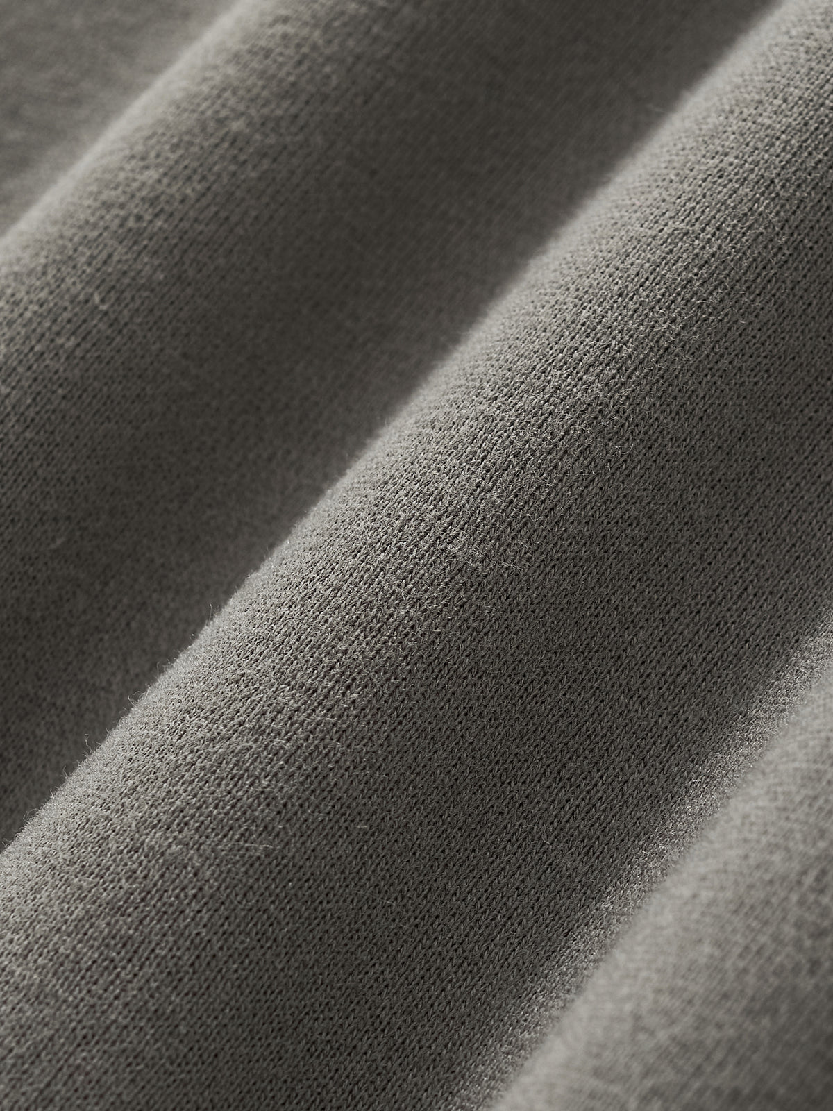 Close-up of soft fabric texture for the HAVEN™ Boxy Hoodie, showcasing the quality of this unisex boxy hoodie.